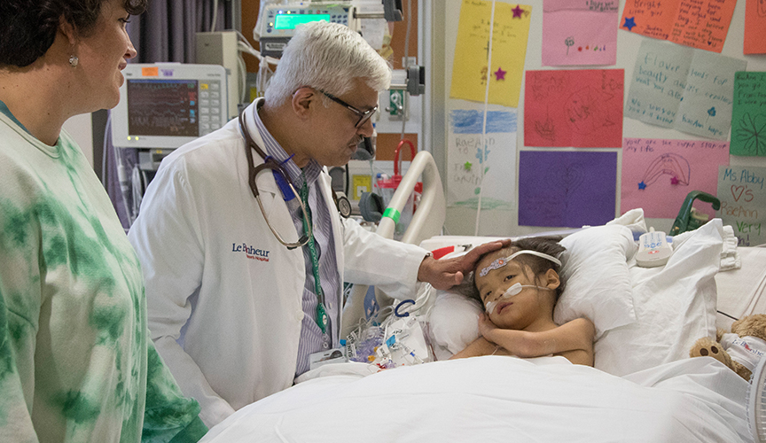 Dr. Samir Shah with Le Bonheur patient in critical care research